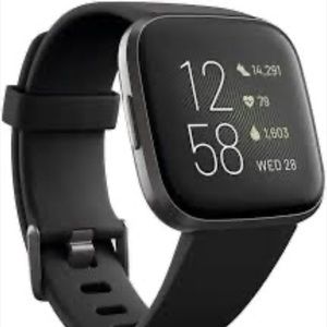 Fitbit with charger and cheetah band